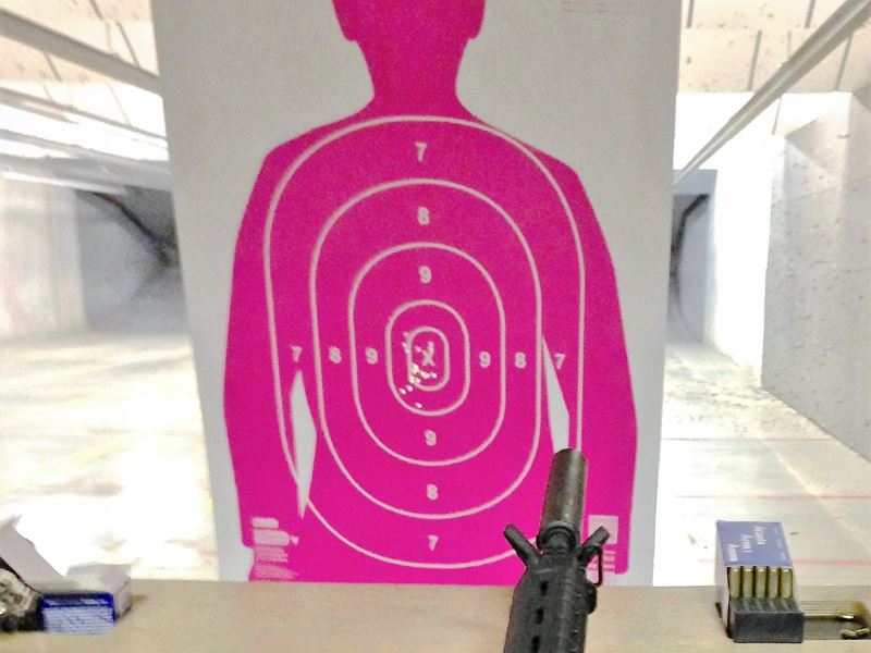 Serenity Choice Reusable Hearing Protection for HUNTING & SHOOTING Earplugs  used for target practice with a pink human outline target sheet.