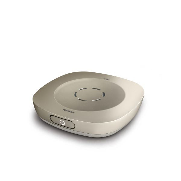 Phonak Roger Table Mic II 052-4125-000P5 wireless microphone for use with hearing aids and cochlear implants. Top and side view shows the directional microphone openings and the on/off button.