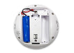 The blue lithium rechargeable battery inside the white Sonic Alert Sonic Shaker Rechargeable Travel Alarm Clock, Model SBP200