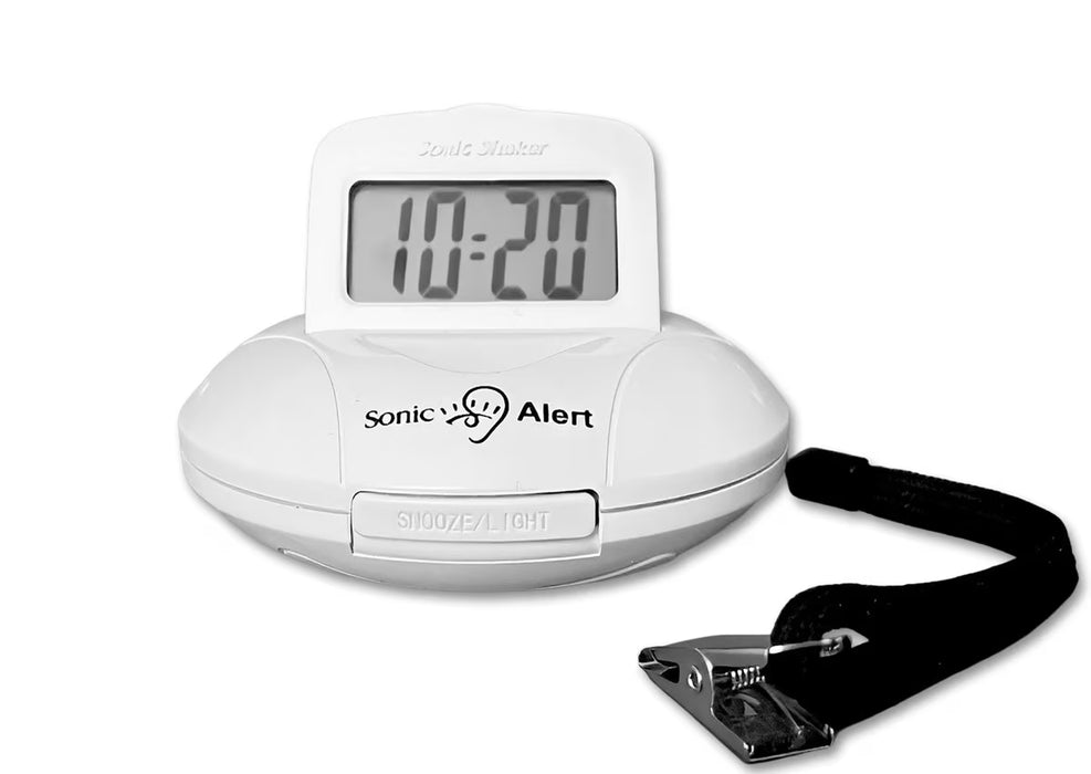 The white Sonic Alert Sonic Shaker Rechargeable Travel Alarm Clock Model SBP200, with a black strap and silver metal pillow clip, on a white background. 