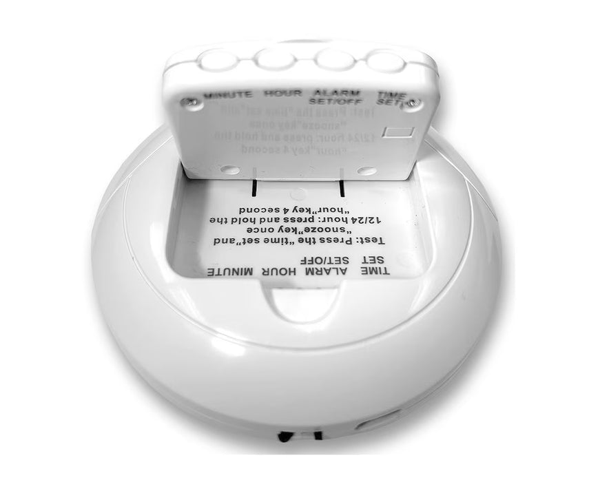 The settings buttons under the flip-down cover on the Sonic Alert Sonic Shaker Rechargeable Travel Alarm Clock Model SBP200 Alarm Clock 
