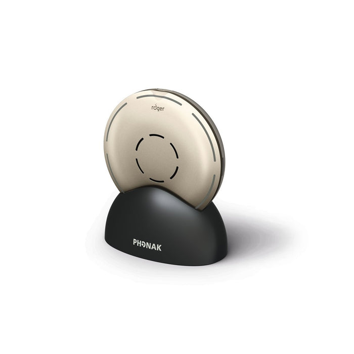 Phonak Roger Select Microphone On Charger Base.  This base can also be used to stream TV or audio for other devices such as a laptop, iPad, Tablet or cell phone. 